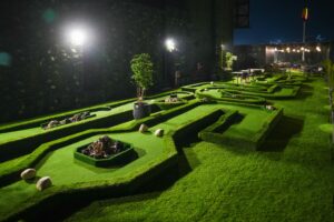 Rooftop mini golf course at Rumble Zone featuring one of the best mini golf in Gurgaon setups with themed greens and creative obstacles