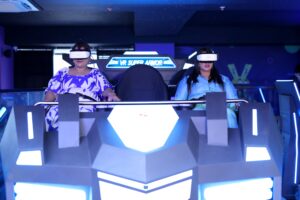 People enjoying a VR ride at a VR gaming zone in Gurgaon at Rumble Zone